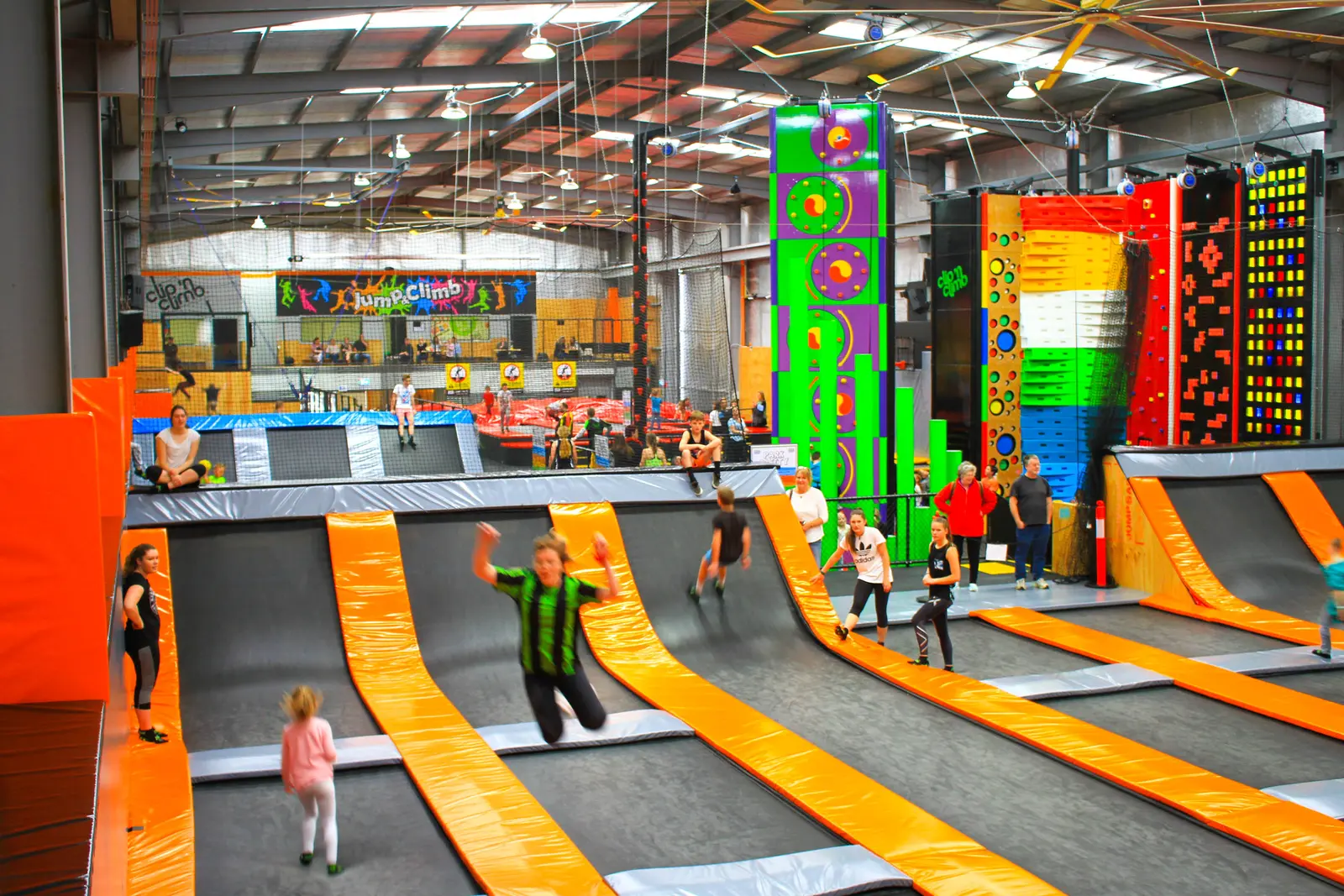 Visitors using the interconnected Jump Arena trampolines